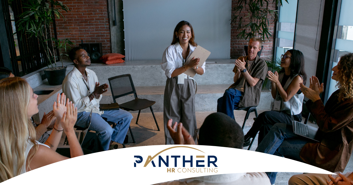 a leadership team participates in a workshop led by Panther HR Consulting